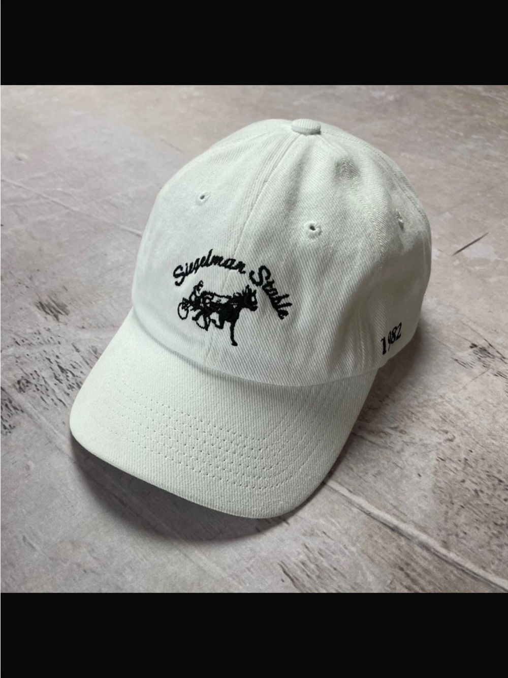 Siegelman Stable White cap